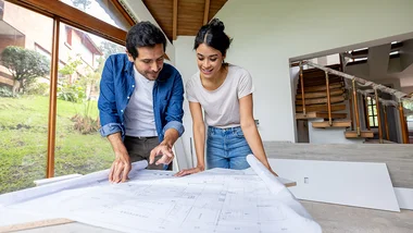 People reviewing blueprint